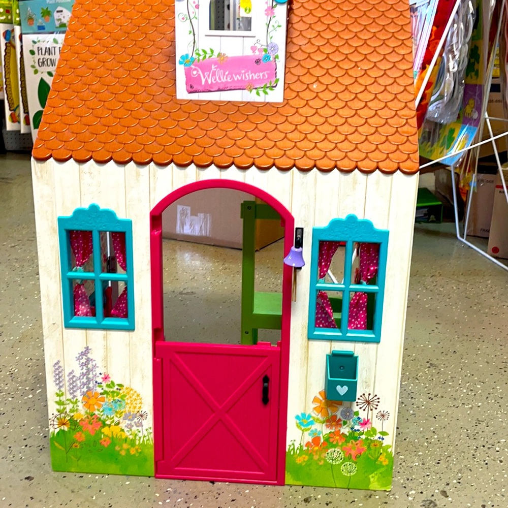 American girl dollhouse with furniture. Slightly used in great condition